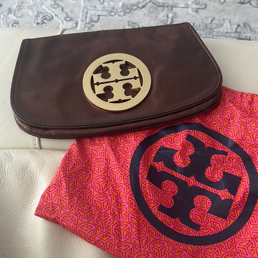 Tory Burch like new Brown metallic logo Leather Clutch with Gold Emblem